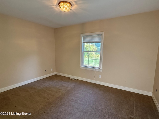 view of carpeted spare room