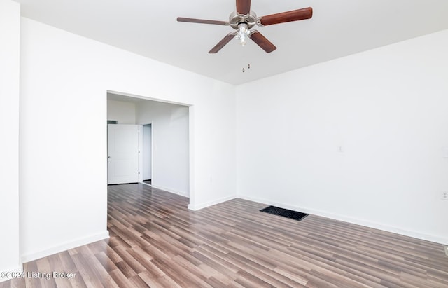 unfurnished room with hardwood / wood-style floors and ceiling fan