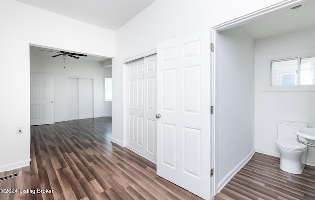 hall with dark hardwood / wood-style floors