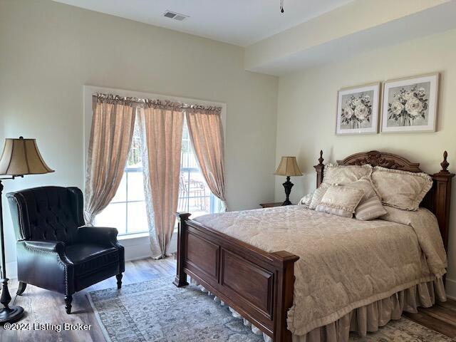 bedroom featuring light wood-type flooring