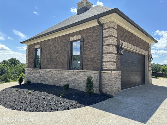 view of property exterior featuring a garage