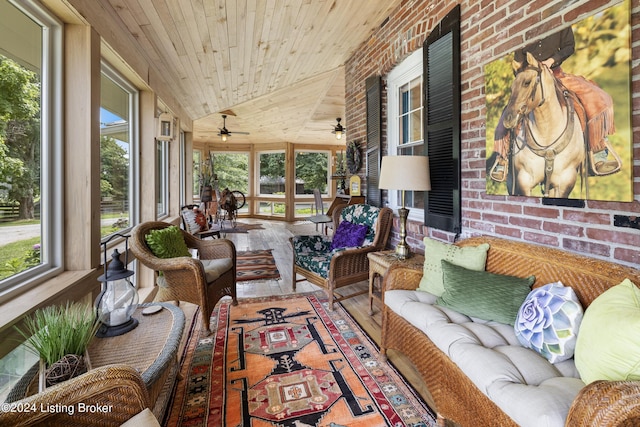 sunroom with plenty of natural light, vaulted ceiling, and wooden ceiling