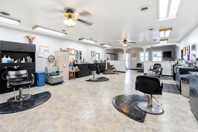 miscellaneous room featuring ceiling fan