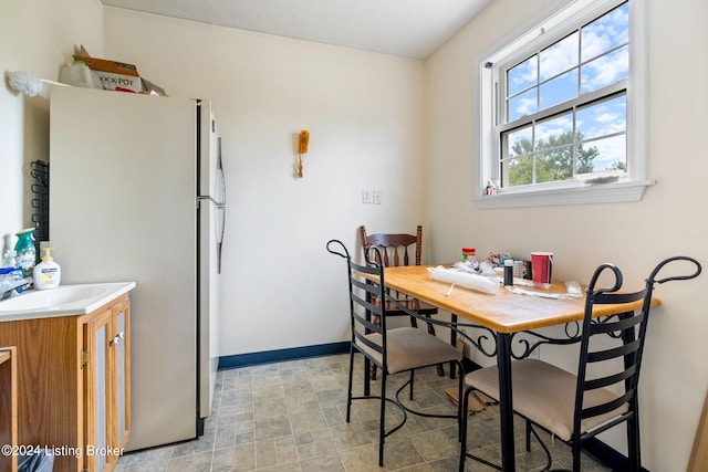 dining room featuring sink