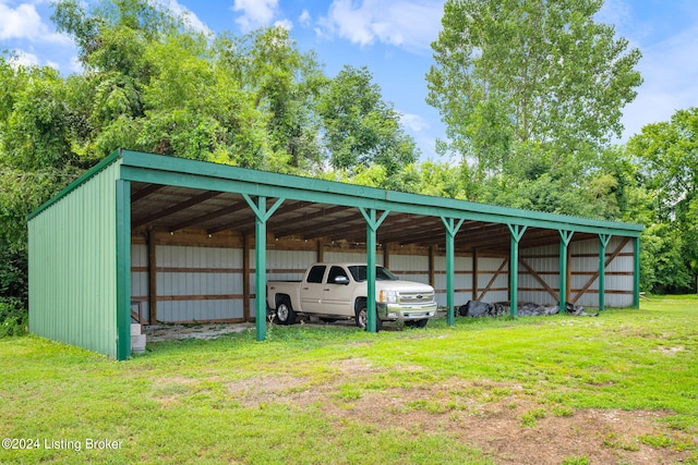 view of outbuilding featuring a yard