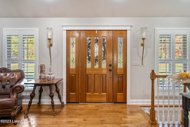 entrance foyer featuring light hardwood / wood-style floors