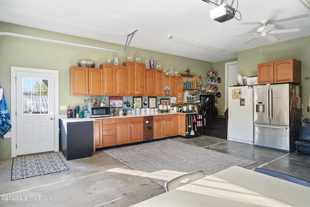 kitchen with ceiling fan and appliances with stainless steel finishes