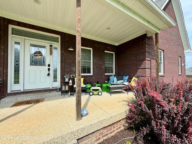 entrance to property with a porch