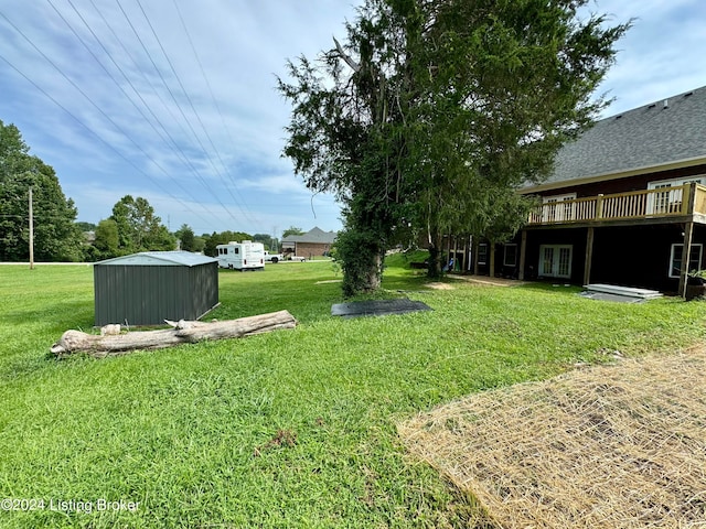 view of yard with a deck