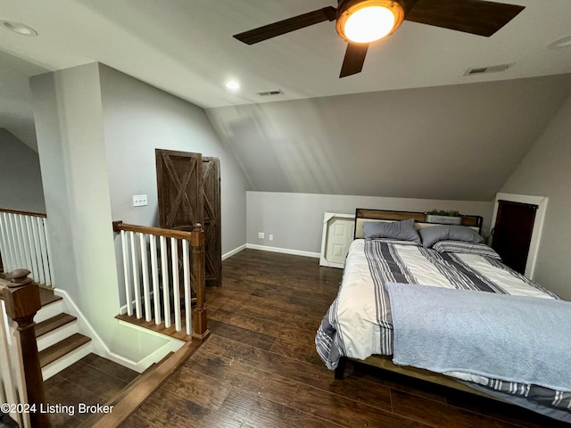 bedroom with lofted ceiling, ceiling fan, and dark hardwood / wood-style floors