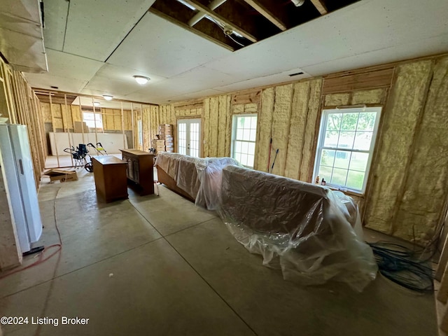 misc room with concrete floors