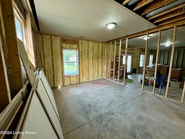 misc room with concrete floors