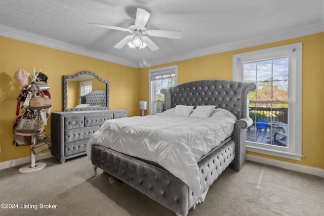 bedroom with light carpet, crown molding, multiple windows, and ceiling fan