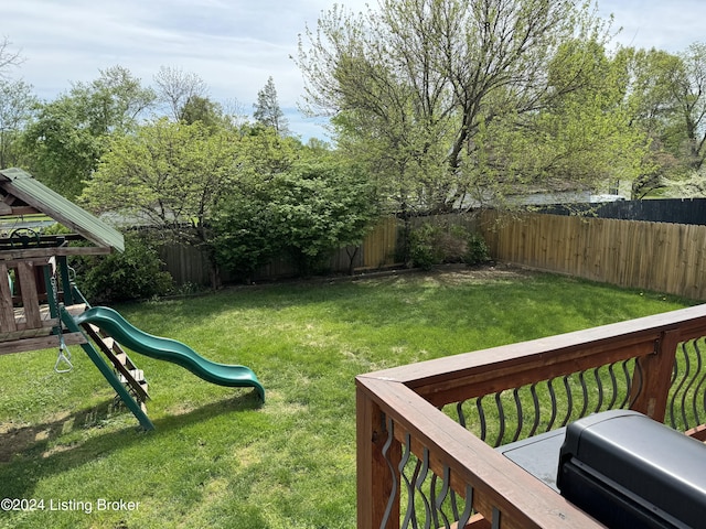 view of yard with a playground