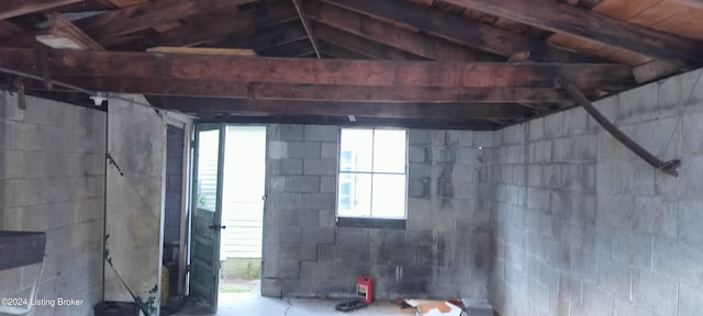 miscellaneous room featuring lofted ceiling, plenty of natural light, and wooden ceiling