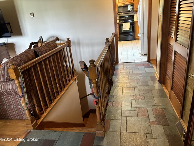 corridor with tile patterned floors