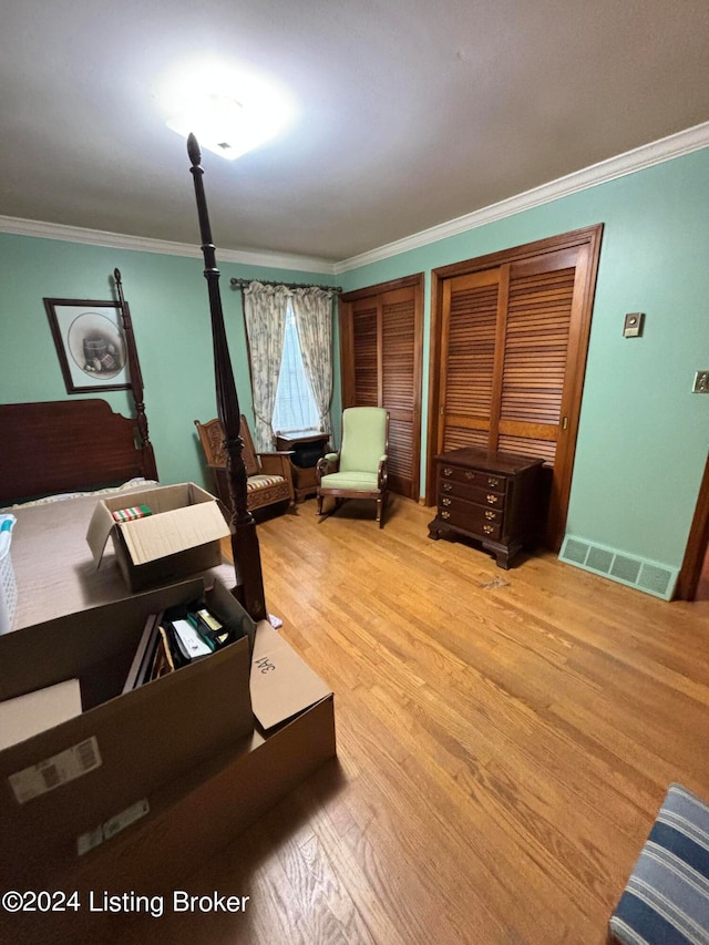 office space featuring ornamental molding and hardwood / wood-style floors