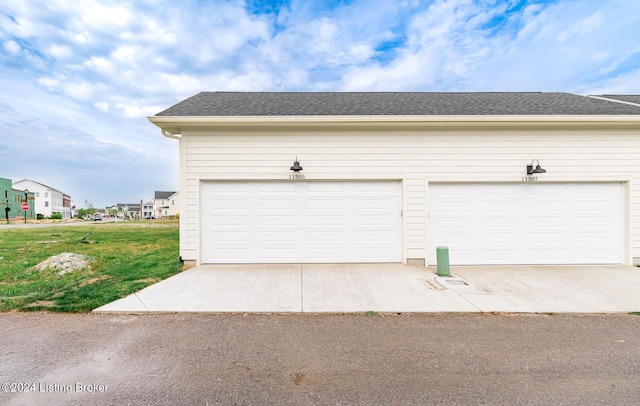 garage with a yard