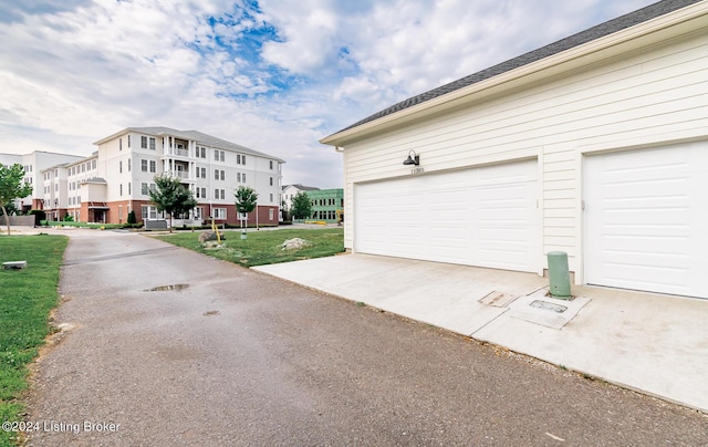 garage with a yard