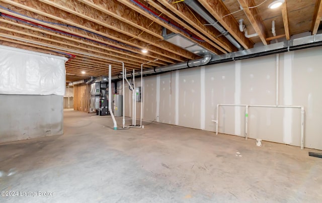 basement featuring water heater