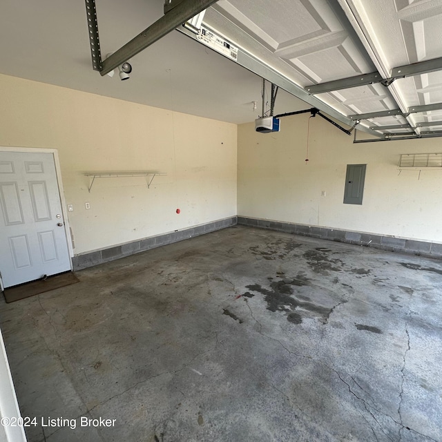 27 Jenkins Rd, Rineyville, KY 40162 - garage with electric panel and a garage door opener