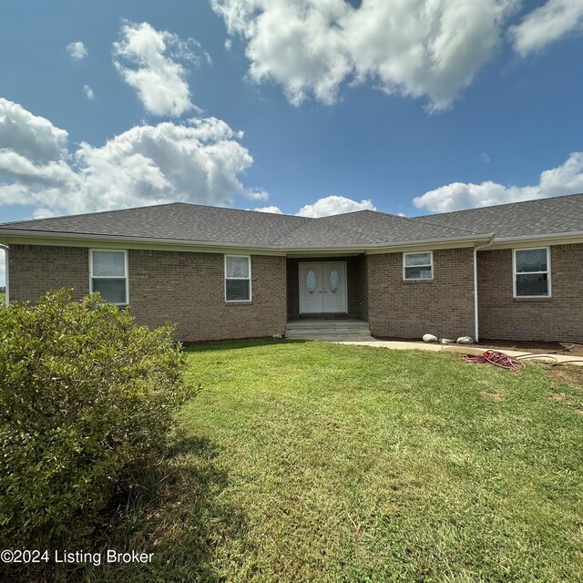 view of front of home with a front yard