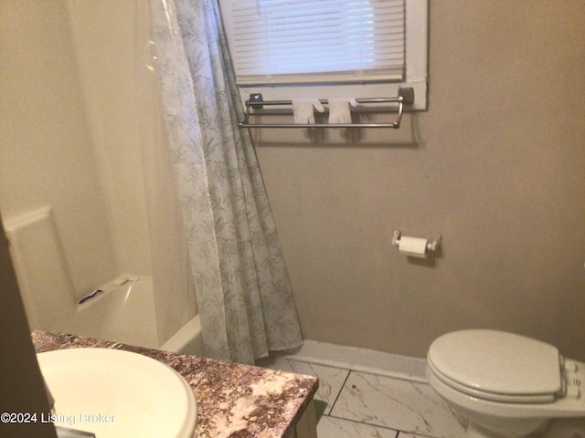 full bathroom featuring vanity, toilet, and shower / tub combo