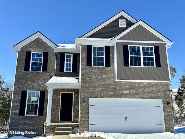 view of front of property with a garage