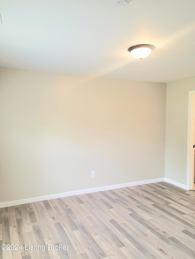 empty room with light wood-type flooring