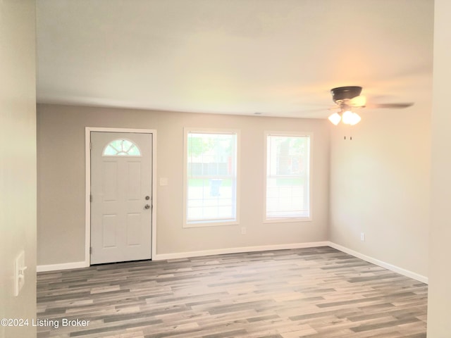 entrance foyer featuring ceiling fan and hardwood / wood-style flooring