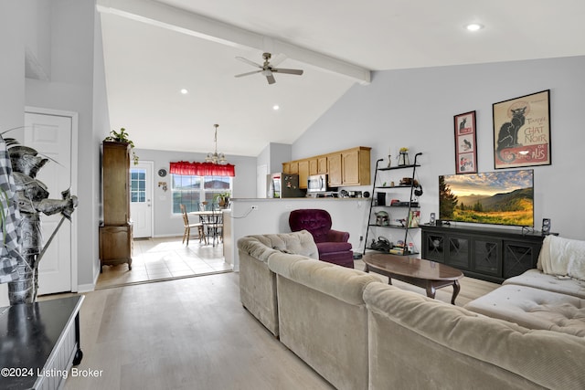 living room featuring beam ceiling, high vaulted ceiling, light hardwood / wood-style flooring, and ceiling fan