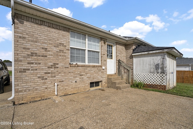 rear view of house featuring a patio area