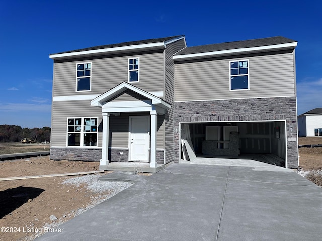 view of front of home with a garage