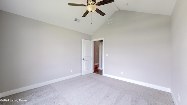 unfurnished room with ceiling fan, carpet flooring, and high vaulted ceiling