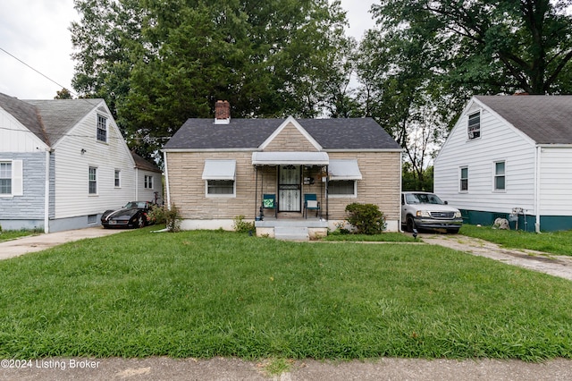 bungalow with a front yard