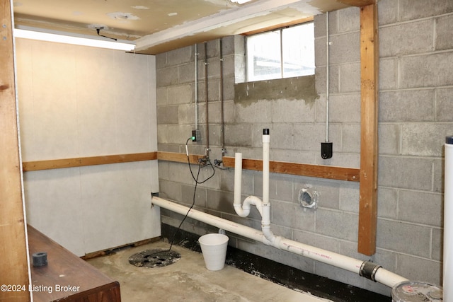 bathroom with concrete flooring