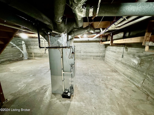 basement featuring heating unit