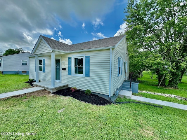 view of front of home with a front yard