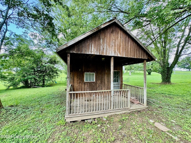 view of outdoor structure with a lawn