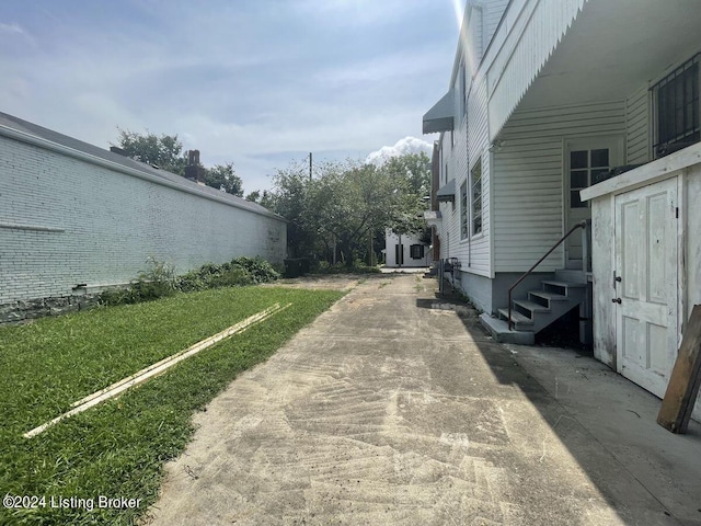 view of home's exterior featuring a yard