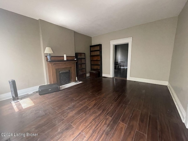 unfurnished living room featuring hardwood / wood-style floors