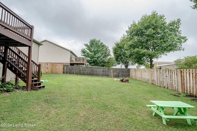 view of yard with a deck