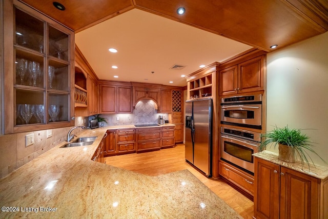 kitchen with open shelves, a sink, visible vents, and stainless steel appliances