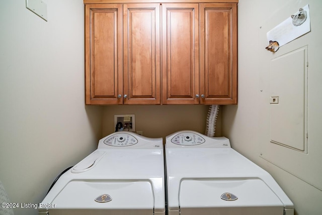 laundry room with cabinet space and independent washer and dryer