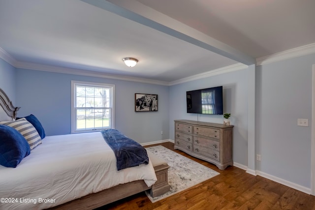 bedroom featuring crown molding and hardwood / wood-style floors