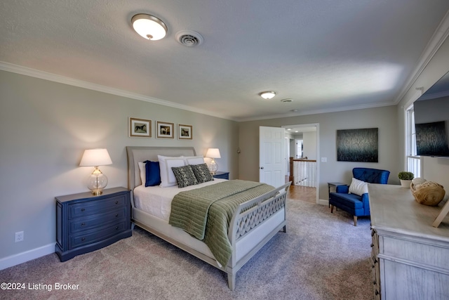 carpeted bedroom featuring crown molding