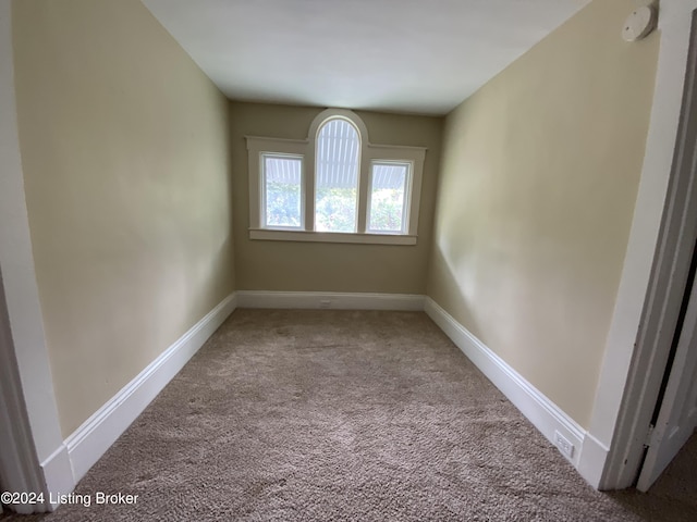 view of carpeted spare room