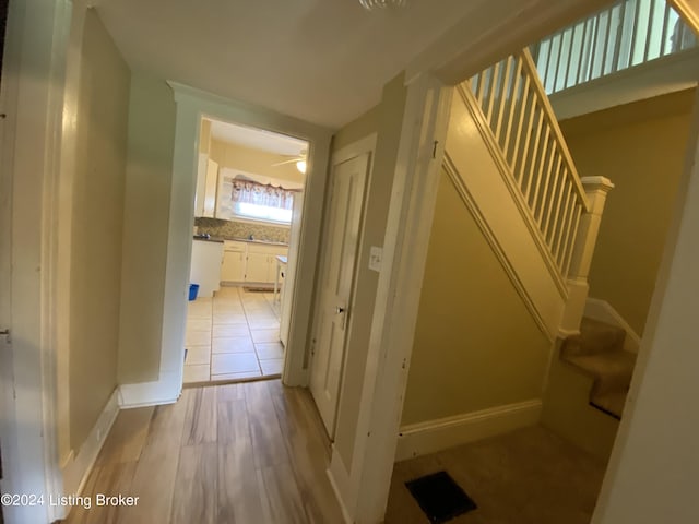 hall featuring light wood-type flooring