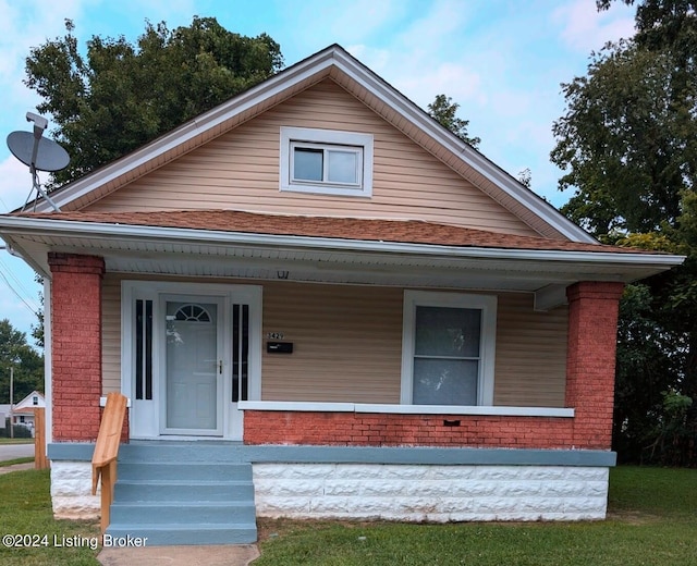 bungalow-style home featuring a porch