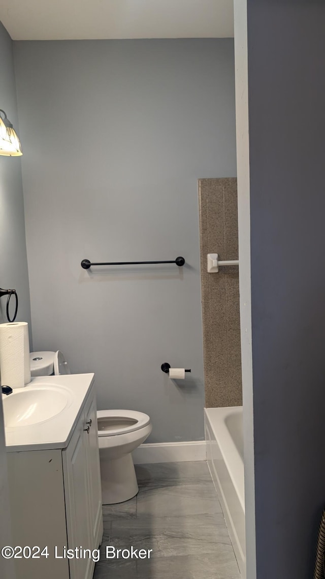 bathroom with hardwood / wood-style floors, toilet, and vanity